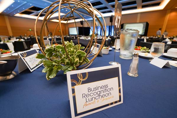 Table with Business Recognition Luncheon card