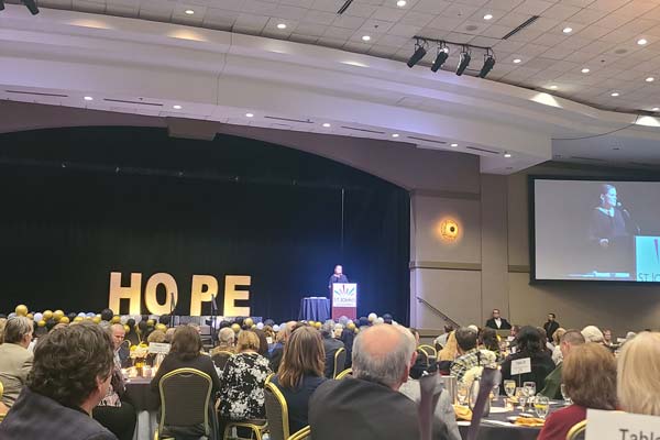 Restoring Hope Gala with speaker on stage