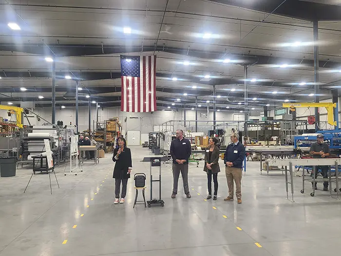 EDL doing ribbon cutting