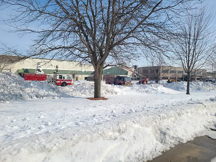 Green Bay Converting front of building with fire trucks