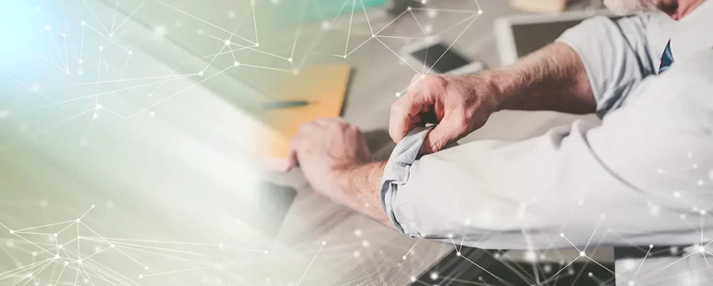 man rolling up his sleeves