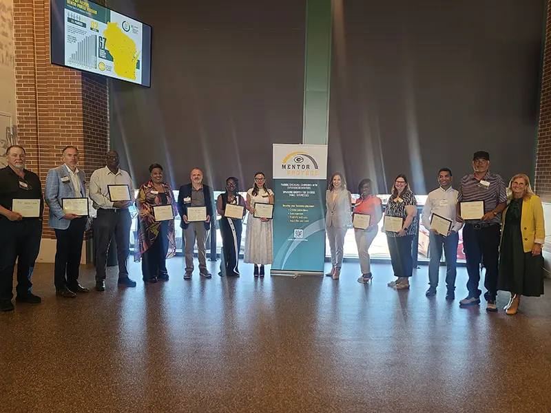 Group picture at Packer Protege event