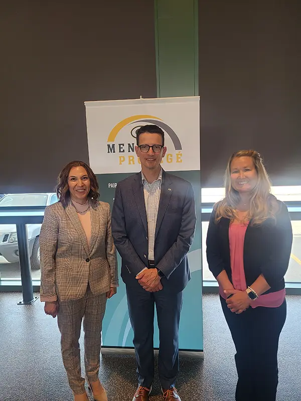 3 people at Packer Protege event